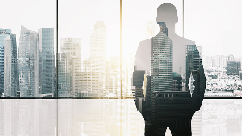 business and people concept - silhouette of businessman over office window and singapore city skyscrapers background and sun light double exposure effect